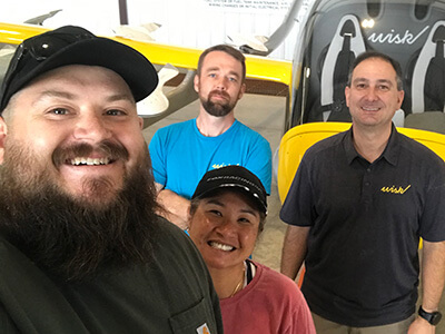 Aircraft designer sketching on glass